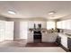 Bright and modern kitchen with stainless steel appliances, white cabinetry, and stylish backsplash at 2985 Catalina Dr, Decatur, GA 30032