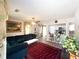 Inviting living room featuring modern flooring, a ceiling fan, and a seamless flow into the kitchen at 2985 Catalina Dr, Decatur, GA 30032