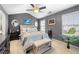 Cozy bedroom with neutral tones, ceiling fan, and large windows at 331 Greystone Pkwy, Hiram, GA 30141