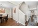 Welcoming entryway showcasing hardwood floors, stairway, and view into dining room at 331 Greystone Pkwy, Hiram, GA 30141