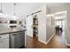 Kitchen Pantry with sliding barn door for convenient food and supply storage at 331 Greystone Pkwy, Hiram, GA 30141