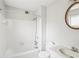 Bright bathroom with white tiled tub, updated fixtures, and a clean aesthetic at 6700 Roswell Rd # 14C, Atlanta, GA 30328
