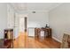 Bedroom view featuring hardwood floors and an open doorway leading to another area at 6700 Roswell Rd # 14C, Atlanta, GA 30328