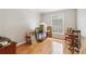 Bedroom showing hardwood floors, a window and a view to the exterior at 6700 Roswell Rd # 14C, Atlanta, GA 30328