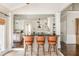 Stylish breakfast area with granite counters, bar seating, and an open layout that flows into the kitchen at 275 Tynebrae Pl, Roswell, GA 30075