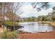 Enjoy picturesque views from the community lake and lakeside seating at 275 Tynebrae Pl, Roswell, GA 30075