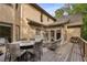 An expansive deck featuring outdoor furniture, a dining area, and a grill, perfect for gatherings and enjoying the outdoors at 275 Tynebrae Pl, Roswell, GA 30075