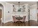 Charming dining nook featuring built-in seating, custom shelving, and a cozy atmosphere for Gathering meals at 275 Tynebrae Pl, Roswell, GA 30075