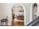 Dining room view from hall archway, showcasing elegant chandelier at 275 Tynebrae Pl, Roswell, GA 30075
