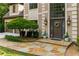Charming front entrance with stone walkway and mature landscaping at 275 Tynebrae Pl, Roswell, GA 30075