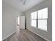 Cozy bedroom with hardwood floors and a bright window with blinds at 5300 Peachtree Rd. # 3107, Chamblee, GA 30341