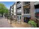 Beautiful apartment complex with brick and gray exterior and iron railings on balconies at 5300 Peachtree Rd. # 3107, Chamblee, GA 30341