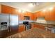 Modern kitchen boasts stainless steel appliances and granite countertops for meal prep at 5300 Peachtree Rd. # 3107, Chamblee, GA 30341