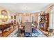 Formal dining room with chandelier, traditional decor, large window and hardwood floors at 540 Saint James Pl, Marietta, GA 30064