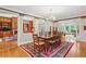 Formal dining room featuring a large dining table, chandelier, and classic decor at 540 Saint James Pl, Marietta, GA 30064