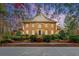 Handsome two-story home with brick exterior, manicured landscaping, and a grand entrance, exuding curb appeal at 540 Saint James Pl, Marietta, GA 30064