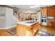 Open floorplan with a kitchen island and eat-in nook with lots of natural light at 540 Saint James Pl, Marietta, GA 30064