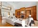 Cozy living room with built-in shelving, fireplace, and adjacent second-floor balcony at 540 Saint James Pl, Marietta, GA 30064