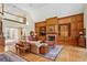 Comfortable living room features vaulted ceiling, built-in shelving, fireplace and second floor balcony at 540 Saint James Pl, Marietta, GA 30064