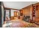 Elegant living room with hardwood floors, fireplace, built-in shelves, and a plush rug at 540 Saint James Pl, Marietta, GA 30064