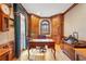 Home office with custom wood paneling, built-in cabinets, and a large desk with a marble top at 540 Saint James Pl, Marietta, GA 30064
