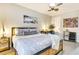 Cozy bedroom featuring modern decor, ceiling fan, and decorative artwork at 920 Memorial Se Dr # 35, Atlanta, GA 30316