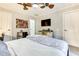 The bedroom boasts artistic decor, contemporary furniture, and a ceiling fan at 920 Memorial Se Dr # 35, Atlanta, GA 30316
