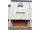 Exterior shot of a home showing the garage door and minimalist architectural details at 920 Memorial Se Dr # 35, Atlanta, GA 30316