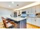 Modern kitchen with stainless steel appliances, granite countertops, and a stylish kitchen island at 920 Memorial Se Dr # 35, Atlanta, GA 30316