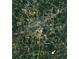 Overhead aerial view of land in Carrollton featuring roads, forests, and proximity to city amenities at 1074 Whooping Creek Rd, Carrollton, GA 30116