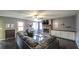 Spacious living room with hardwood floors, fireplace, and neutral color palette at 1074 Whooping Creek Rd, Carrollton, GA 30116