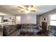Comfortable living room with hardwood floors and a ceiling fan to keep cool at 1074 Whooping Creek Rd, Carrollton, GA 30116