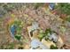 Birds eye view displaying the residence's location on a wooded lot within a quiet cul-de-sac neighborhood at 1270 Smokehouse Trl, Cumming, GA 30041