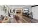 This finished basement features a large sectional, barn doors, and a large television at 1270 Smokehouse Trl, Cumming, GA 30041
