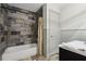 Bathroom with custom tub, shower, and fixtures, plus modern design elements at 1270 Smokehouse Trl, Cumming, GA 30041