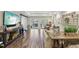 Bright living room featuring hardwood floors, recessed lighting, and sliding doors to the backyard at 1270 Smokehouse Trl, Cumming, GA 30041