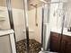 Updated bathroom shower featuring tile floor and neutral colors at 2675 Sardis Chase Ct, Buford, GA 30519