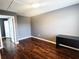 Neutral bedroom with hardwood floors, a window, and closet access at 2675 Sardis Chase Ct, Buford, GA 30519