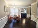 Inviting dining room with hardwood floors, a chandelier, and ample natural light at 2675 Sardis Chase Ct, Buford, GA 30519