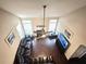 Spacious living room enhanced by high ceilings, a fireplace, and a sectional sofa at 2675 Sardis Chase Ct, Buford, GA 30519