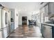 Modern kitchen leads to a charming breakfast nook and features sleek stainless steel appliances at 3287 Shady Valley Ln, Loganville, GA 30052