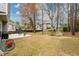 Expansive backyard with trees offers a great area for relaxation at 4015 Embassy Way, Lilburn, GA 30047