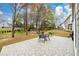 Large backyard with a spacious patio and plenty of room for outdoor activities at 4015 Embassy Way, Lilburn, GA 30047