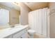 Bright bathroom features a vanity with a modern countertop at 4015 Embassy Way, Lilburn, GA 30047
