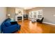 Bright living room with hardwood floors, fireplace, and lots of natural light at 4015 Embassy Way, Lilburn, GA 30047