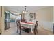 Cozy dining room featuring neutral paint, crown molding, carpet, and a chandelier light fixture at 2160 Liberty Hts, Fairburn, GA 30213