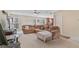 Cozy living room featuring carpet, fan, fireplace, and a neutral color scheme at 2160 Liberty Hts, Fairburn, GA 30213