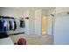 Spacious walk-in closet with clothes racks and shelves, offering ample storage at 3489 Central Park Dr, Loganville, GA 30052