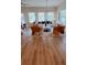 Open living room with wood floors, neutral decor, lots of windows and modern furnishings at 4276 Notting Hill Dr # 23, Atlanta, GA 30331