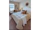 Cozy bedroom with a comfortable bed, bench seating, and a neutral color palette at 4276 Notting Hill Dr # 23, Atlanta, GA 30331
